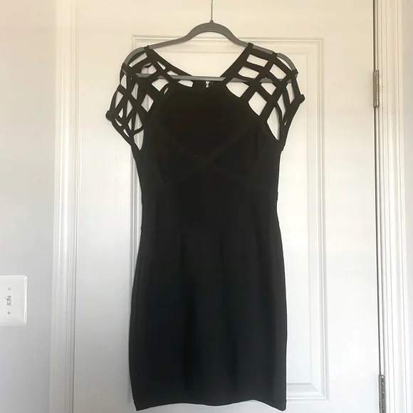 black long sleeve mini dress near me A Classic Off Shoulder Long Sleeve Mini Dress main image 0